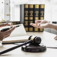 Attorneys or lawyers are advising clients in defamation cases, they are collecting evidence to bring charges against the parties for damages. The concept of defamation case counseling. Attorneys or lawyers are advising clients in defamation cases, they are collecting evidence to bring charges against the parties for damages. The concept of defamation case counseling.